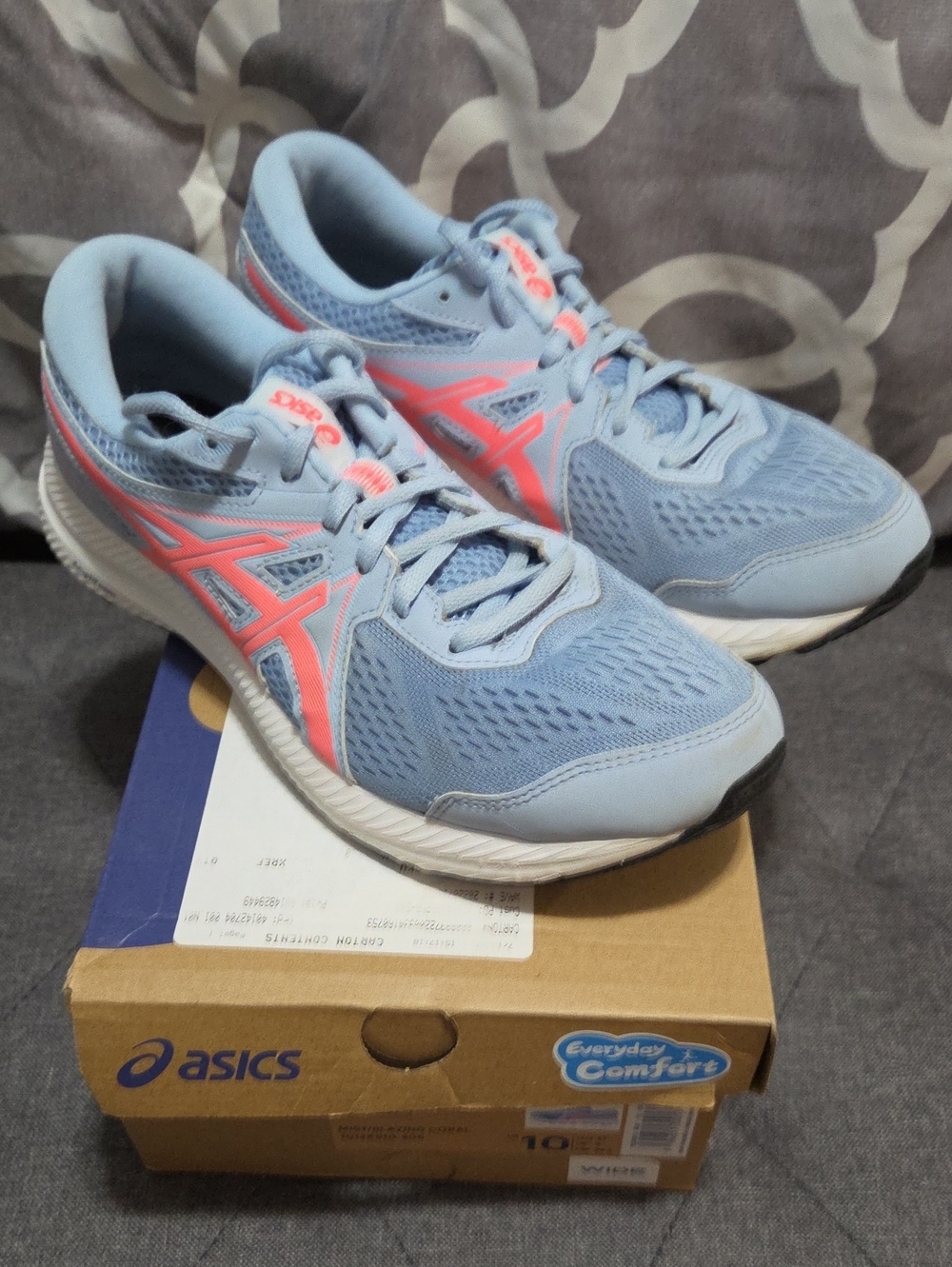 ASICS Women's Light Blue Athletic Sneakers with Pink Accents